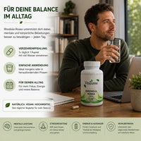 Vitaluma Rhodiola Rosea Kapseln zur täglichen Einnahme mit Wasser in einer natürlichen Lifestyle-Szene für den Alltag